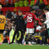 Wolves vs. Manchester United, Controversial penalty decision, Wolves' frustration, Manchester United victory, VAR intervention,