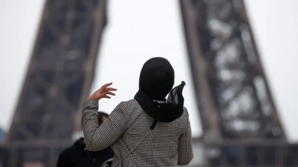 France hijab ban in sports, Muslim headscarf ban, French secularism and sport, Hijab in athletics, Muslim female athletes France, Sylvie Eberena weightlifter, France religious freedom, Women in sports hijab, French sport headscarf law, Hijab discrimination in France,